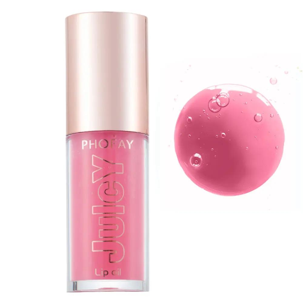 PHOFAY Juicy Lip Oil in pink shade with rose gold cap and glossy liquid swatch with bubbles.