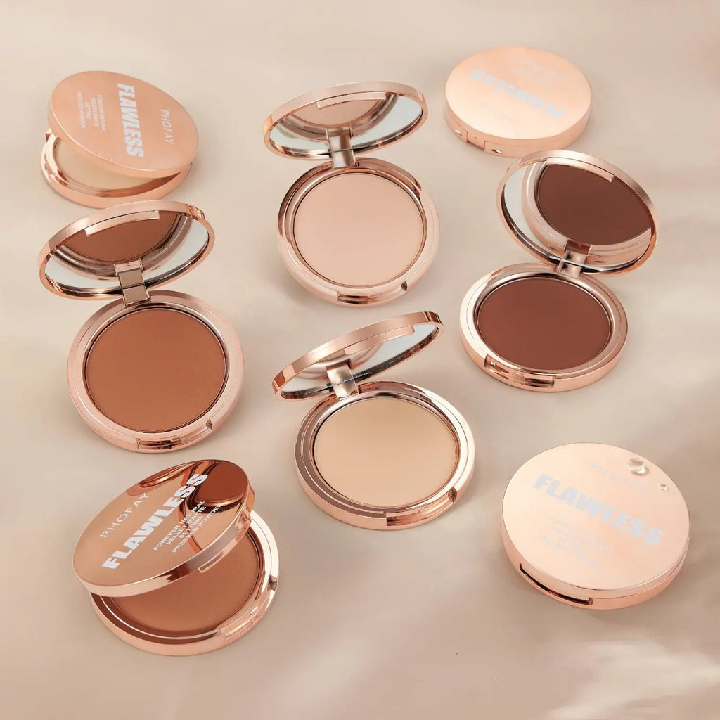 PHOFAY matte setting pressed powders in various shades with rose gold compact cases, some open showing powder and mirrors.