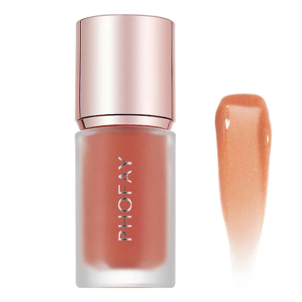 PHOFAY matte mousse liquid blush in muted peach shade with frosted glass bottle and rose gold cap next to swatch.