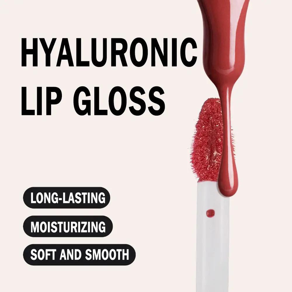Red hyaluronic lip gloss dripping with applicator showing creamy, smooth texture against white background.
