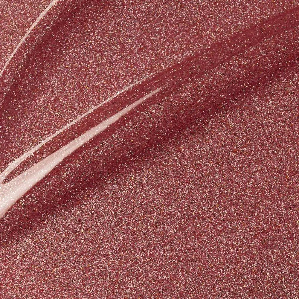 Glossy dusty rose lip gloss swatch with subtle shimmer and smooth, glass-like finish.